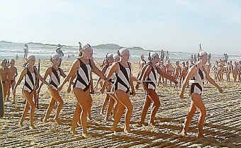 Sawtell SLSC’s march past team on its way to victory at the North Coast Branch Carnival. Sawtell SLSC’s march past team on its way to victory at the North Coast Branch Carnival.